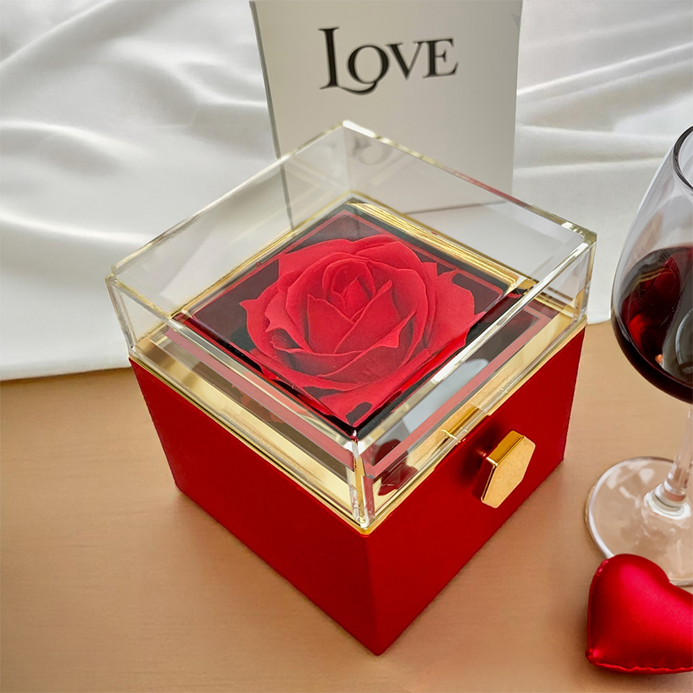 Liebesknoten mit rotierender Rosengeschenkbox
